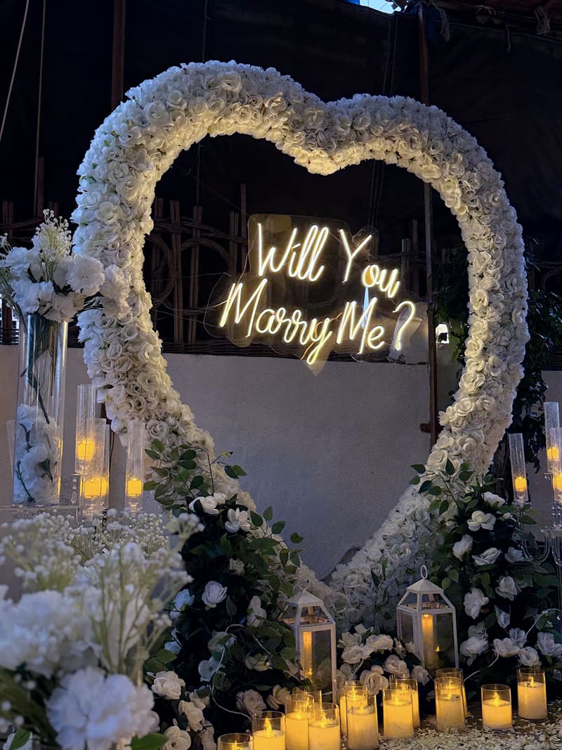 Proposal setup with candles and flowers by Cupid Vow, Chandigarh