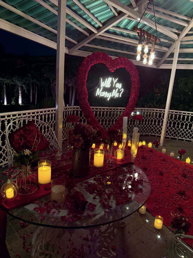 Proposal setup with candles and flowers by Cupid Vow, Chandigarh