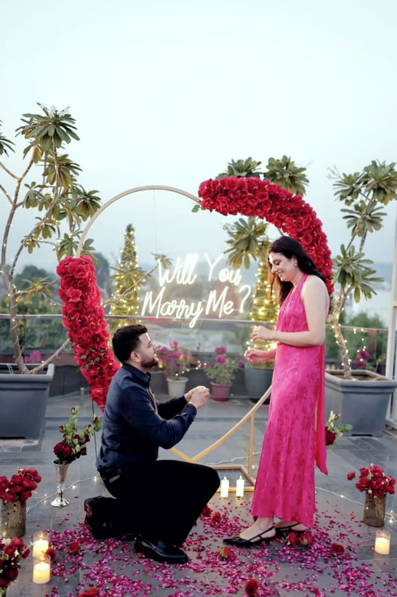 Proposal setup with candles and flowers by Cupid Vow, Chandigarh