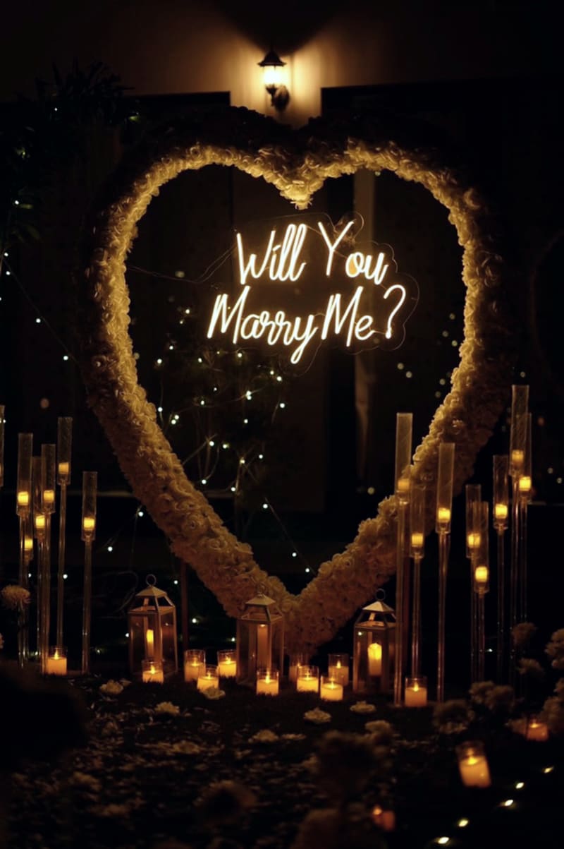 Proposal setup with candles and flowers by Cupid Vow, Chandigarh