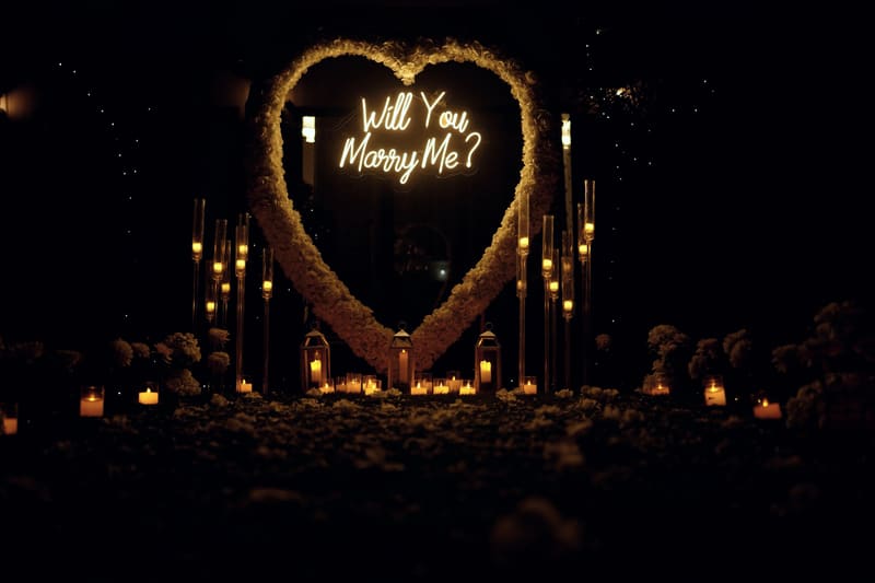 Proposal setup with candles and flowers by Cupid Vow, Chandigarh